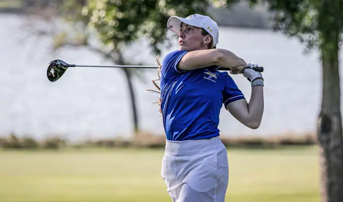 Golfer mid swing